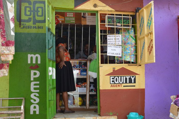 A mobile money and bank agent in Nairobi (file photo)