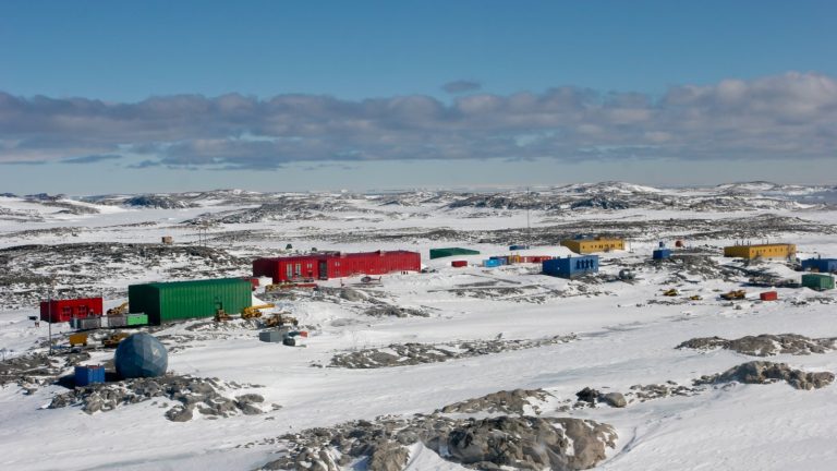 Coloured buildings of Australia’s Casey research station on the Antarctic coast