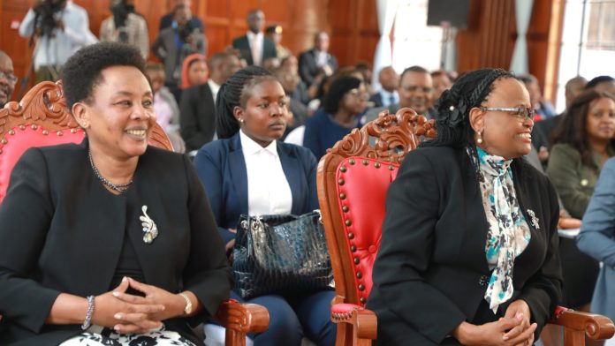 Kenya’s Chief Justice Martha Koome sits with other judicial officials at a formal event