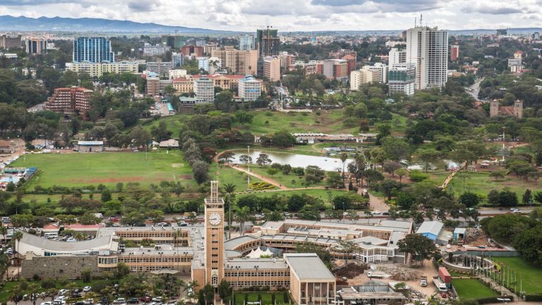 Kenya’s Parliament Buildings and clock tower seen across Uhuru Park in Nairobi