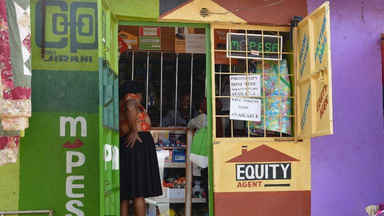 An M-Pesa and Equity agent shopfront in Kenya.