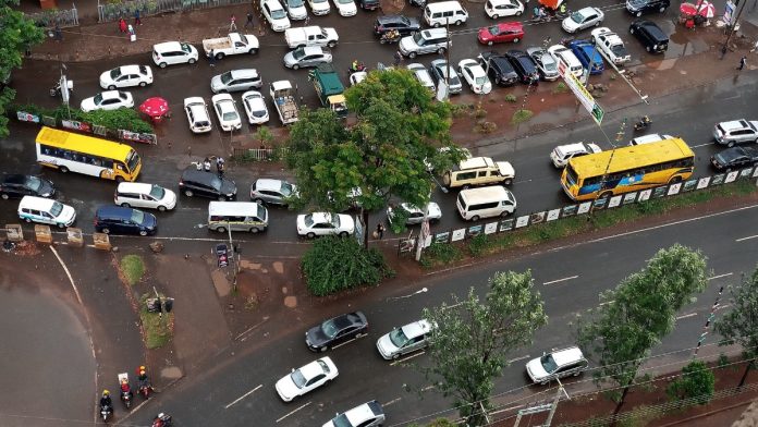 Traffic and parked cars on a road in Nairobi (file photo)