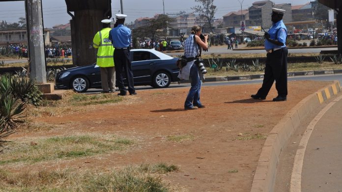 Kenyan police officers on foot patrol in a Nairobi neighbourhood (file photo)