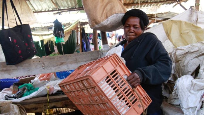 Vegetable vendor in slum (file photo)