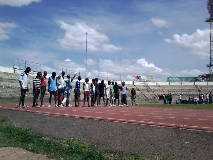 Athletes lining up on the track at Nyayo National Stadium, Nairobi