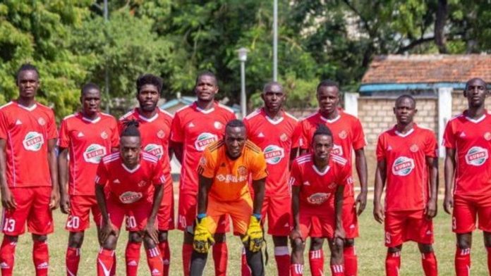 Kibera Black Stars players celebrate a goal