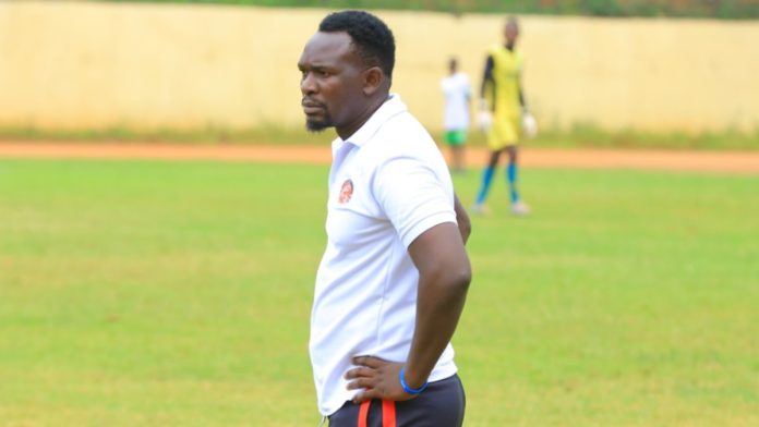 Kibera Black Stars coach Idd Badi on the touchline